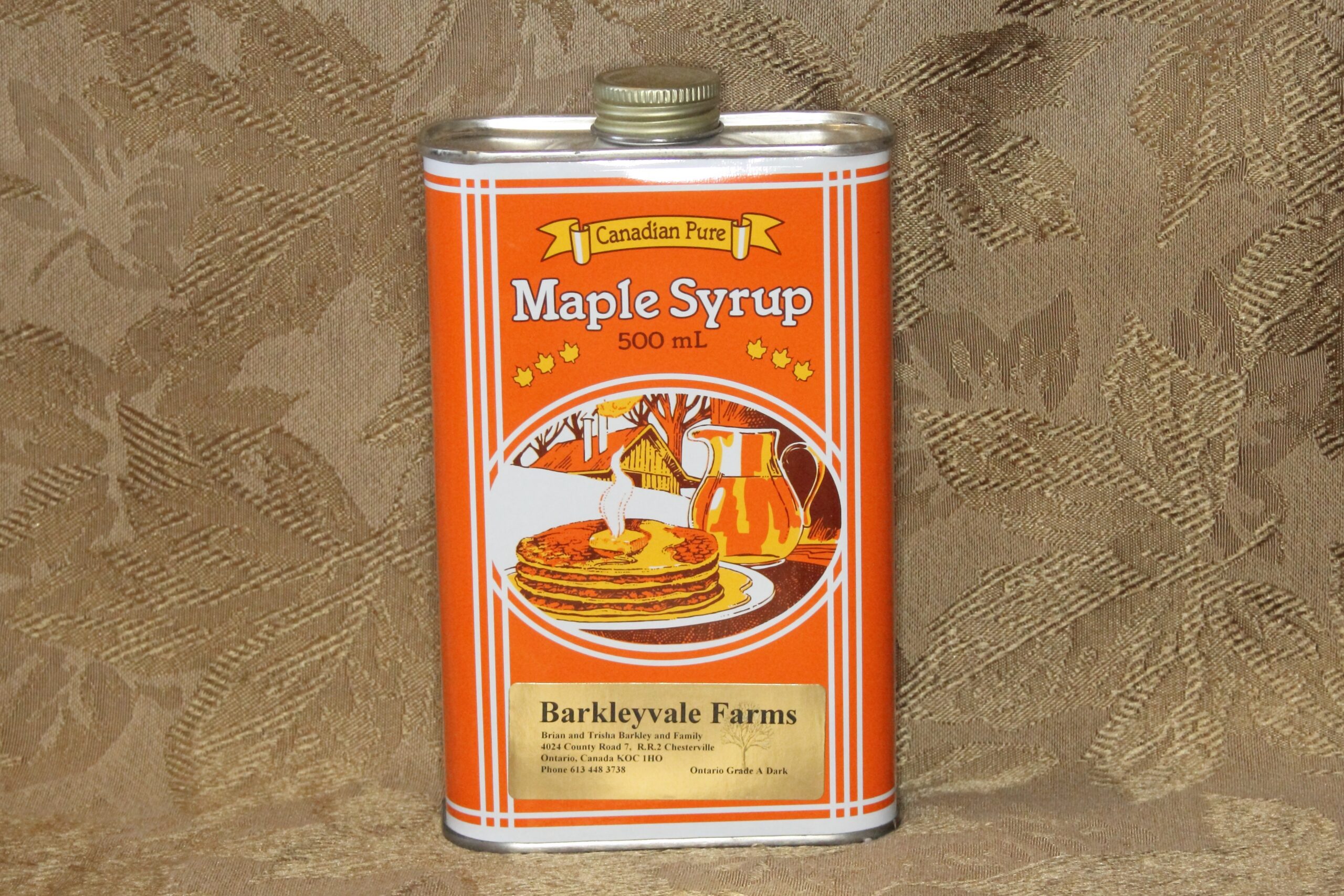 Photo of a tin of maple syrup